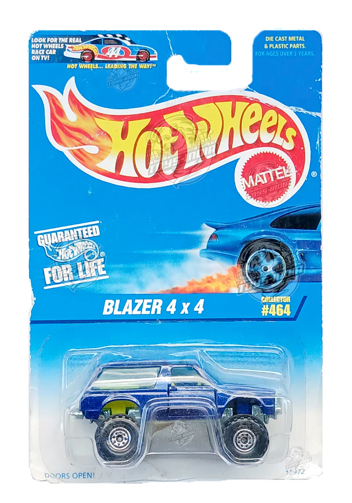 EXCLUSIVES Hot Wheels Chevy Blazer 4x4 - Purple - 1996 Card (Creased Card / Car in Excellent Condition) (With Protector Case)