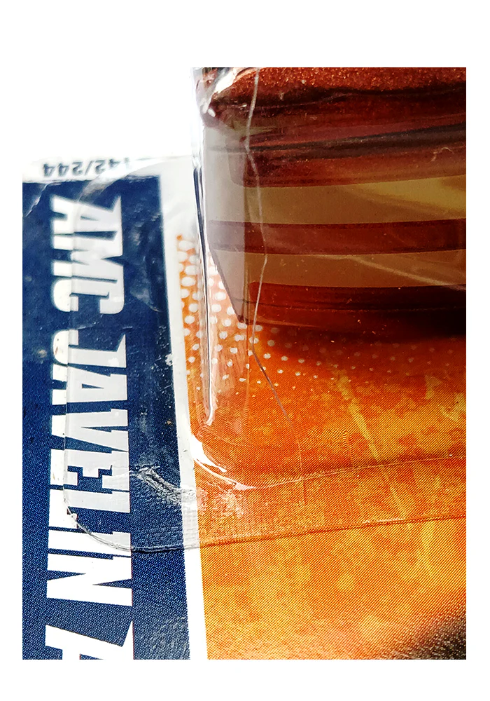 EXCLUSIVES Hot Wheels AMC Javelin AMX - Brown - 2010 Card (Blister Damage / Car in Excellent Condition) (With Protector Case) - Image 2