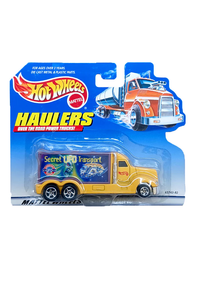 EXCLUSIVES Hot Wheels Haulers Secret UFO Transport Truck - Yellow / Blue - 1998 Card