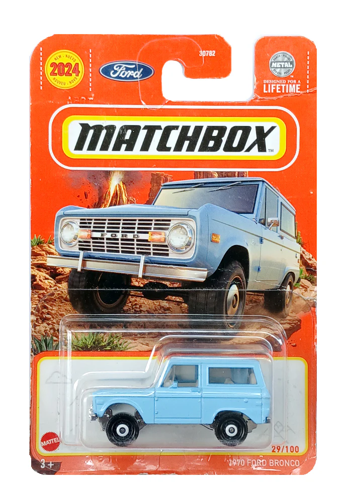 EXCLUSIVES Matchbox 1970 Ford Bronco- Blue - 2024 Card (Creased Card / Car in Excellent Condition) (With Protector Case)